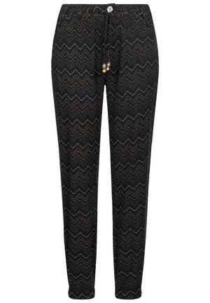 Zwarte taps toelopende broek met een zigzag gestippeld patroon in blauw, beige en bruin, met een elastische tailleband en decoratieve koordkralen.