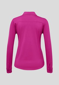 Long-sleeve shirt in vibrant pink, featuring a collar, buttoned cuffs, smooth fabric texture, and a single seam across the upper back.