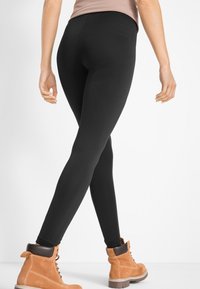 bonprix Leggings - schwarz