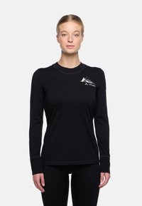 Schwarzes langärmliges Shirt aus weichem Material mit einem weißen Berggrafik-Muster auf der Brust, einem runden Ausschnitt und tailliertem Design.