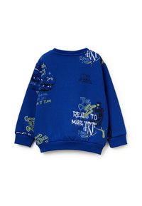 Felpa blu con collo rotondo, polsini a coste e grafiche in stile graffiti in verde e bianco, con frasi e figure in caratteri diversi.