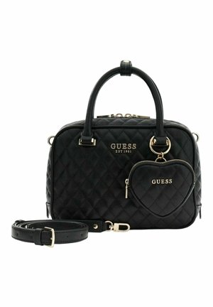 Sac à main noir matelassé avec des garnitures dorées. Dispose de deux poignées supérieures, d'une bandoulière amovible et d'une pochette zippée en forme de cœur.