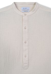 Light beige button-up shirt with a mandarin collar, featuring a textured fabric, five buttons, and tag labeled "CALLIOPE," size L.