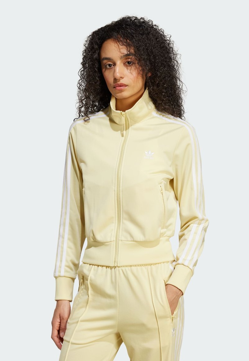 adidas Originals CLASSICS FIREBIRD TRACK - Majica s kapuljačom i patentnim zatvaračem - powder yellow