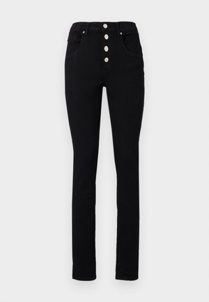 Black high-waisted jeans with a slim fit, featuring five silver snap buttons, and front pockets. Smooth denim texture without patterns.