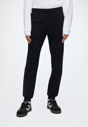 Jack & Jones, JPSTGORDON BOLT - Pantalones deportivos - black