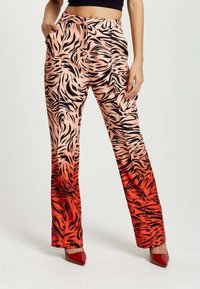 Liquorish WITH SLIT DETAIL - Trousers - red