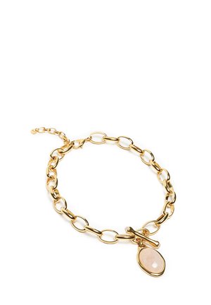 Bransoletka z łańcuszka złotej z owalnym zawieszką z kamieniem, składająca się z połączonych segmentów i zapięcia na zatrzask. Gładka tekstura i błyszczące wykończenie.