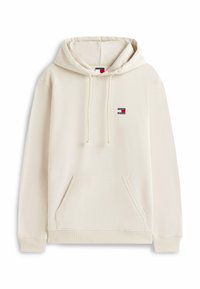 Sudadera color beige claro hecha de una tela suave, con un bolsillo delantero de tipo canguro y capucha con cordón. Pequeño parche con logo en el pecho.