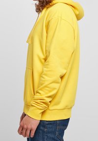 Karl Kani Felpa con cappuccio - yellow