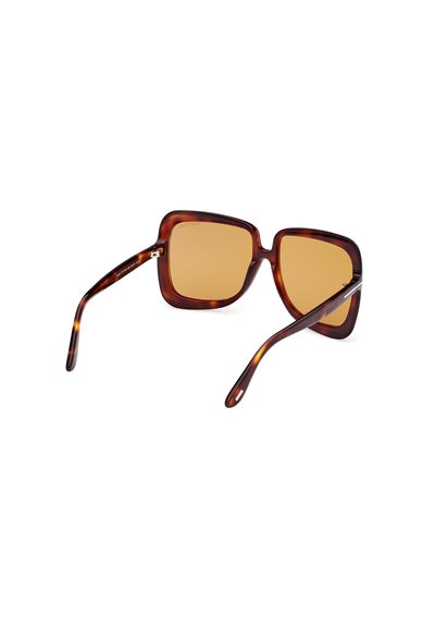 Ochelari de soare în formă pătrată, cu un cadru cu model țestoasă și lentile amber. Au brațe subțiri cu detalii subtile de branding.