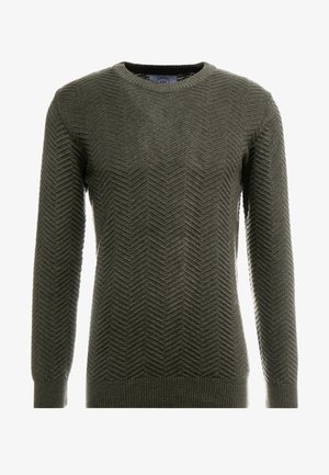 Oliven grønn genser med et strukturert fiskebensmønster, mannsnakke, og ribbede ermer og nederdel. Laget av strikket stoff.