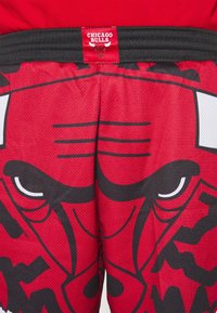Mitchell & Ness Pantalón corto de deporte - black