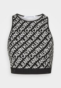 Czarny krótki top na ramiączkach z powtarzającym się białym wzorem "CALVIN KLEIN JEANS", okrągły dekolt i jednolita czarna opaska u dołu.