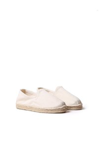 Espadrilles de color beige claro con un upper de tejido texturizado, aberturas elásticas y suelas de yute natural. Diseño simple para calzar fácilmente.