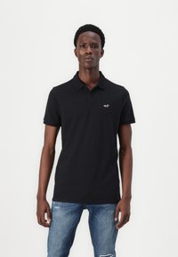 Hollister Co. Stretch Polo 3-Pack - Poloshirt - white/navy/black