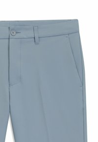Light blue trousers made of smooth fabric. Features a button closure, side pockets, and a tailored fit. Simple design with no visible patterns.