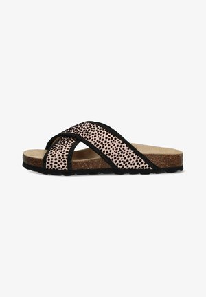 Chanclas negras y rosas con tiras entrecruzadas. La parte superior presenta un patrón de manchas; la suela es de corcho con una base de goma negra texturada.