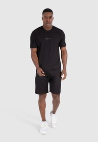 Smilodox LUMIN - T-shirts basic - schwarz