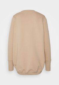 Béžová mikina s dlouhými rukávy, ribovanými manžetami a zakulaceným spodním lemem. Měkká textura látky a jednoduchý design, pohled zezadu.