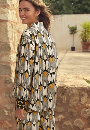 LONG SLEEVE - REGULAR FIT - Button-down blouse - monochrome yellow geometric print