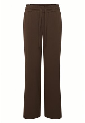 Pruunid laiad püksid, mis on valmistatud pehmest kangast, eristuvad elastse vöökohtadega, millel on reguleeritav nöör. Sile tekstuur, minimaalne detail. 