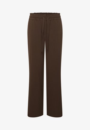 Pruunid laiad püksid, mis on valmistatud pehmest kangast, eristuvad elastse vöökohtadega, millel on reguleeritav nöör. Sile tekstuur, minimaalne detail.