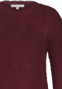 Bordeaux fuzzy lange mouwen trui met ronde hals en label van Red Button maat S bij de kraag.