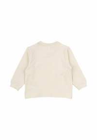 Cremfarbendes langärmliges Shirt mit rundem Ausschnitt. Aus weicher Baumwolle gefertigt. Mit gerippten Bündchen und einfarbigem Stoff ohne Muster.
