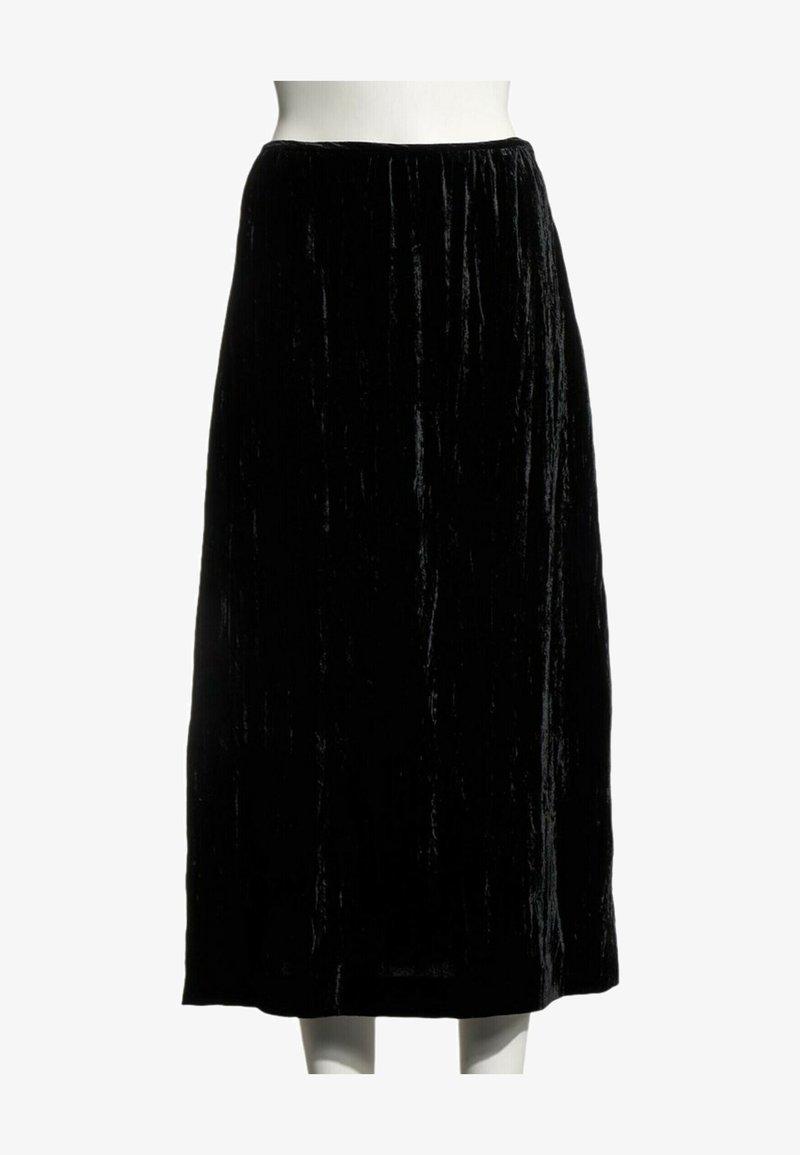 Jupe midi en velours noir avec une taille élastique, présentée sur un buste de mannequin blanc sur fond blanc.