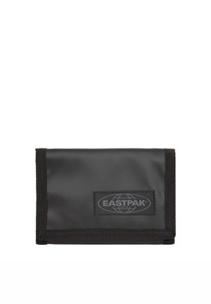Cartera negra de nylon con borde cosido, que presenta un logotipo visible de Eastpak y un diseño rectangular compacto. Superficie texturizada, estilo minimalista.
