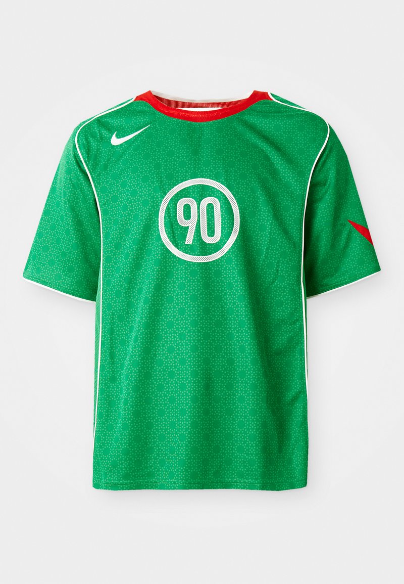 T-shirt de sport Nike vert à manches courtes, avec des accents blancs, un motif à pois et un logo circulaire blanc "90" au centre. Col rouge.