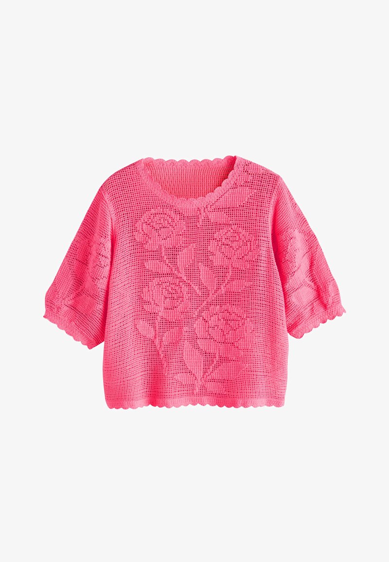Pull court rose en crochet avec motifs floraux, bords festonnés aux manches et à l'ourlet, et un col rond.