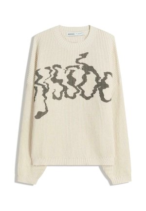Cremefarvet ribbestrik sweater med en løs pasform, prydet med et mørkegrønt abstrakt mønster over fronten. Rund halsudskæring og lange ærmer.