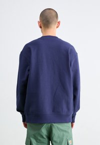 Carhartt WIP AMERICAN SCRIPT - Sudadera - air force blue