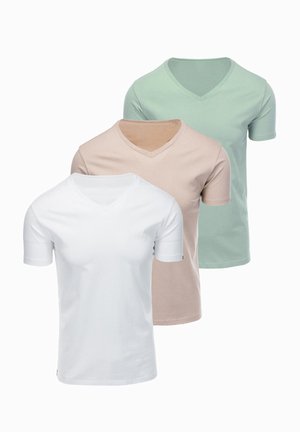 Trois T-shirts à manches courtes unis avec col en V en blanc, beige clair et vert clair, affichés en chevauchement sur un fond blanc.
