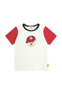 White cotton t-shirt with red short sleeves, featuring a bear wearing a red cap with a logo. Black neckline and small yellow tag on the side.