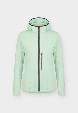 Lysegrøn hættejakke med sort frontlynlås og lynlås på brystlommen, med en hvid logo på venstre bryst.