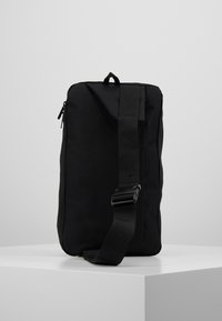 adidas Performance ESSENTIALS LINEAR SPORT CROSS BODY BAG - Umhängetasche - black/white