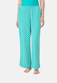 Pantalons de pyjama turquoise avec un motif floral blanc, taille élastique, jambes droites et tissu léger.