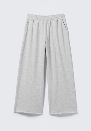 Graue weit geschnittene Hose aus einem weichen Baumwollmischgewebe. Verfügt über einen elastischen Taillenbund und seitliche Taschen. Einfaches, lässiges Design.