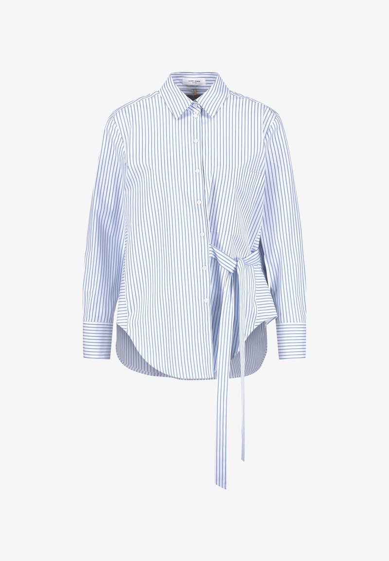 Camicia a maniche lunghe blu e bianca a righe con colletto button-down, orlo curvo e dettaglio a cravatta di lato. Realizzata in tessuto leggero.