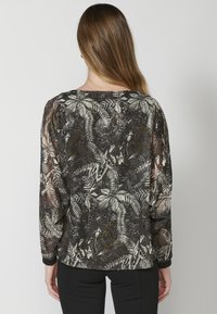 Koroshi Bluse - black