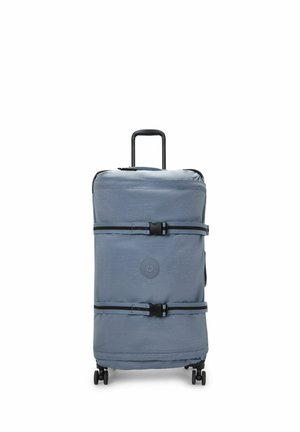 Soft-sided blue suitcase with a textured finish, featuring a retractable handle, double zippers, and two adjustable straps. Four wheels for mobility.