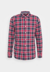 Camicia a maniche lunghe a quadri con base blu navy e motivi a scacchi rossi e bianchi, chiusura con bottoni e colletto classico. Tessuto morbido.