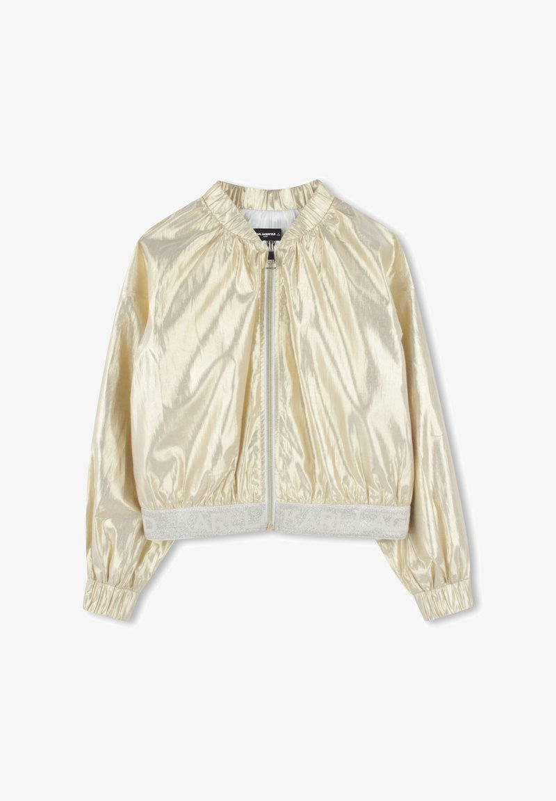 Veste bomber en crème légèrement métallisée avec épaules froncées, poignets élastiques, zip à l'avant et détail de ceinture de marque.