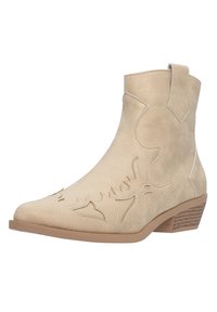 Botín de ante beige con diseño floral recortado, tacón apilado y costuras en contraste. Textura suave y Punta redondeada.
