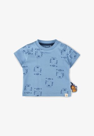 Blaues Babyshirt mit kurzen Ärmeln, bedruckt mit dunkelblauen Tigerköpfen und einem kleinen, an der Seitennaht angebrachten Stoffetikett in Form eines Löwen.