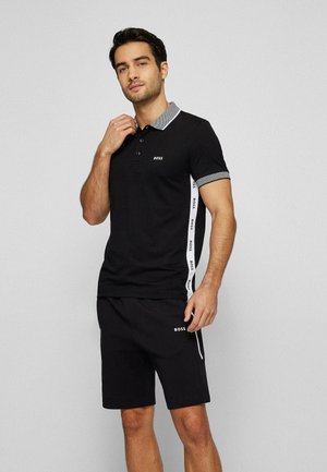 PAULE - Polo - black