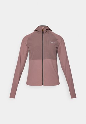 Veste à capuche zippée de couleur rose poussiéreux, avec un panneau foncé contrastant, des manches longues et un petit détail de poche avant.
